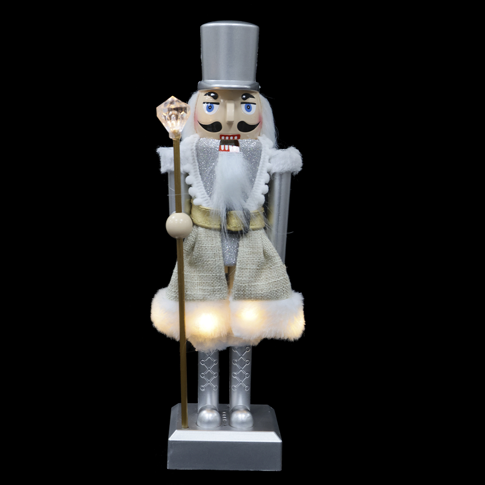 BONECO NATAL QUEBRA NOZES C/LED E SOM - 8 MUS (PRATA DOURADO) 28cm